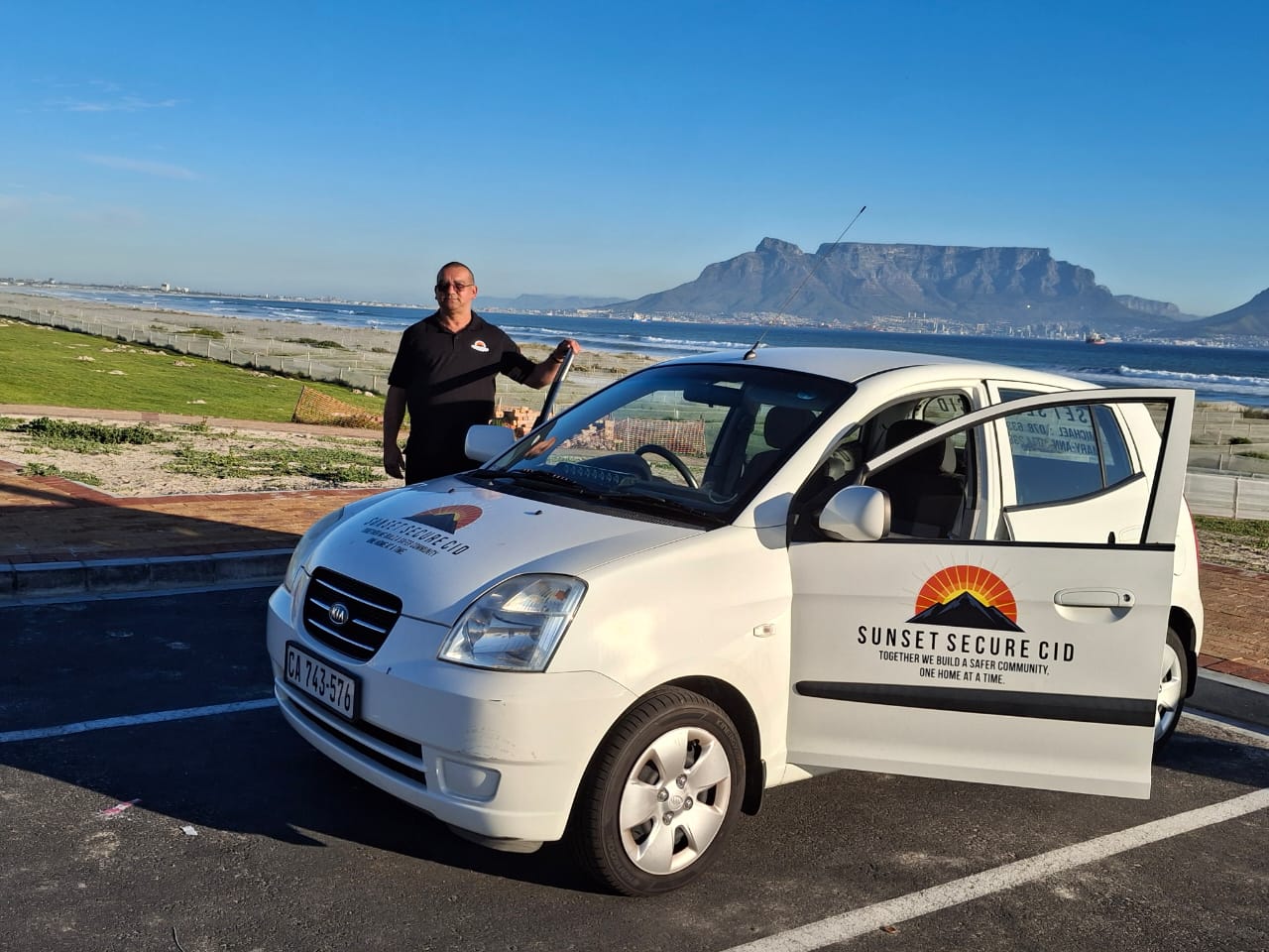 CEO Michael Scholtz with patrol vehicle