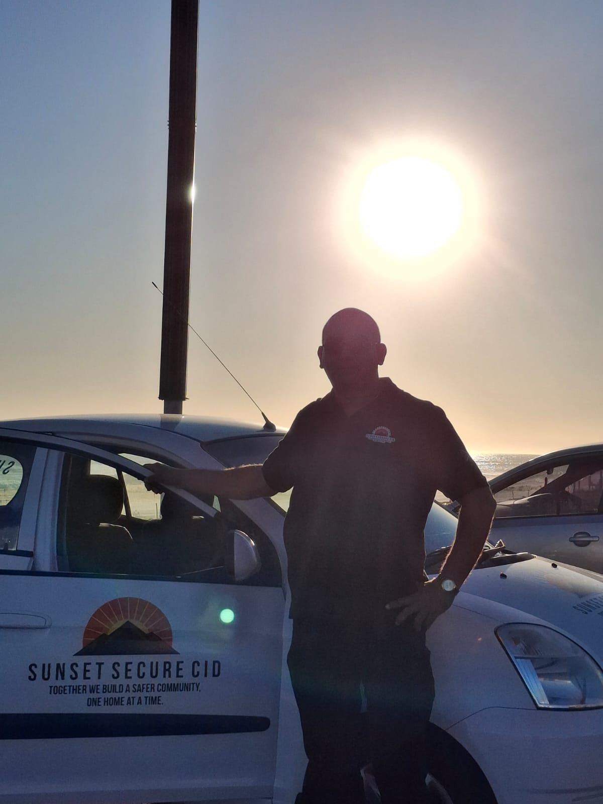 Operator silhouetted against the sunset